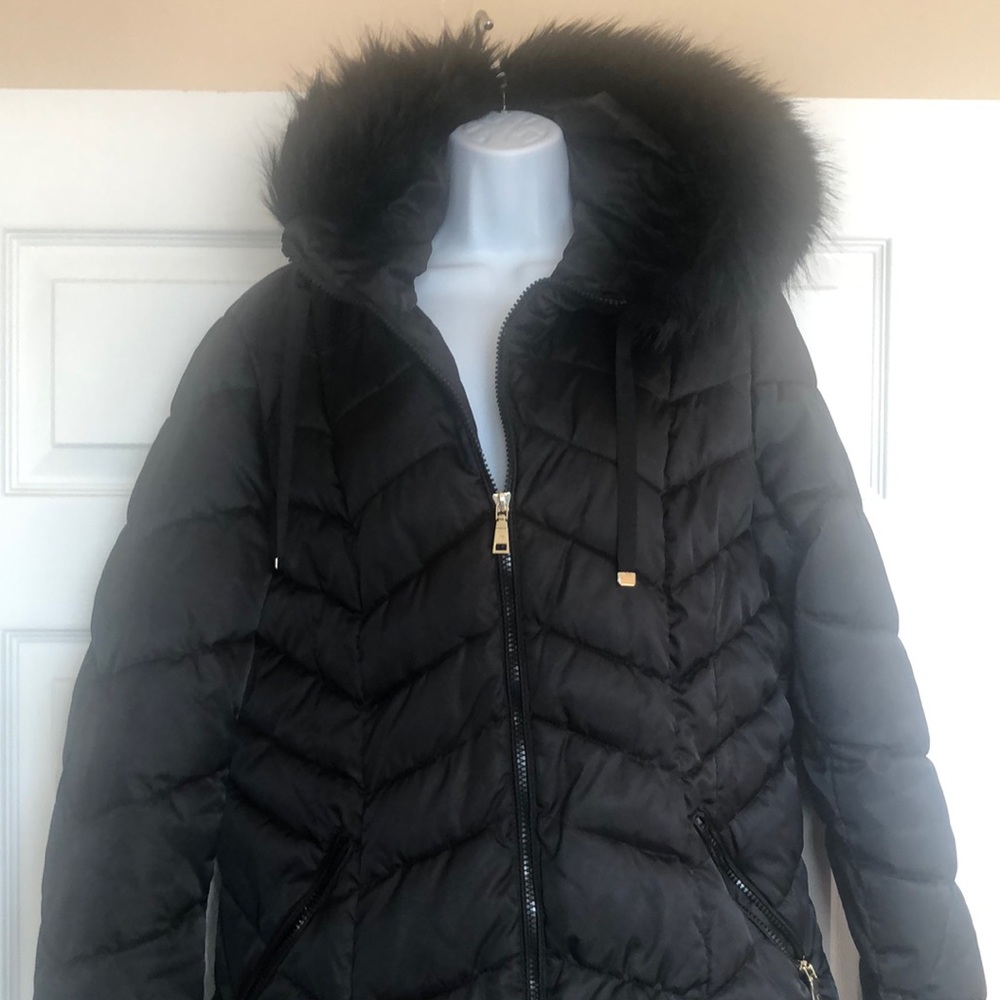 NWOT Tahari mid length winter jacket. In excellent condition with stunning trim!